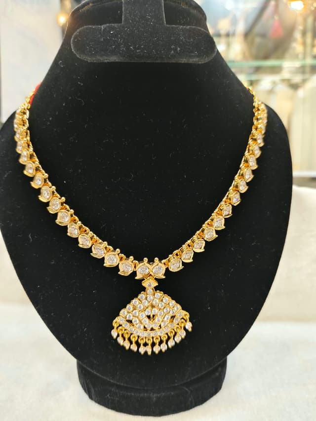 Micro gold plated hangingsVellora Jewels Micro Gold Plated Simple Necklace | Gatti Katada Stone Design | Festive/Casual Wear